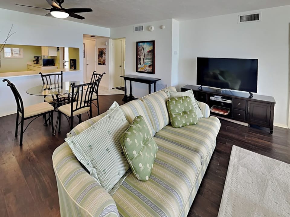 Living Room - Balcony Access, Ocean Views, Full Sleeper Sofa + TV