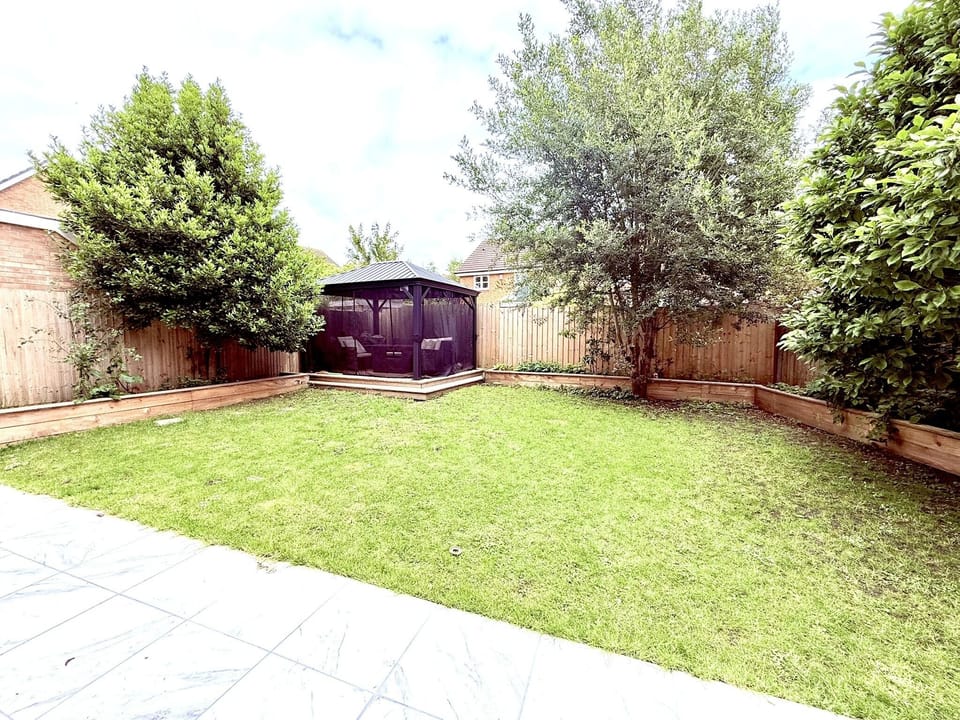 Fully secure garden with gazebo dining area
