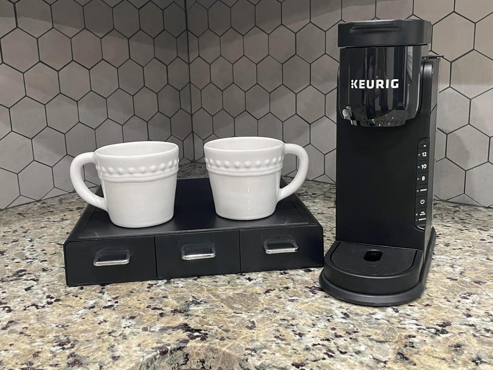 Keurig coffee maker and pods provided because Coffee tastes best on vacation. 