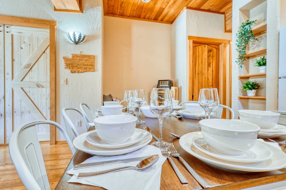Natural Light Streaming Over the Dining Table Setting. CB2