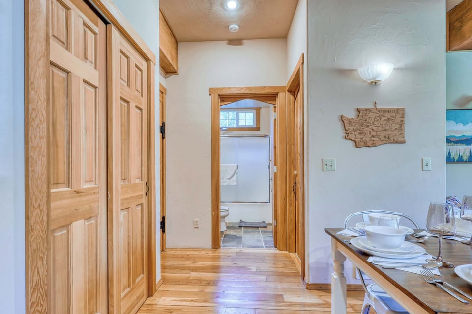 Soft lighting and the warm glow of the cabin’s interior create a cozy setting for evening dinners with friends or family.