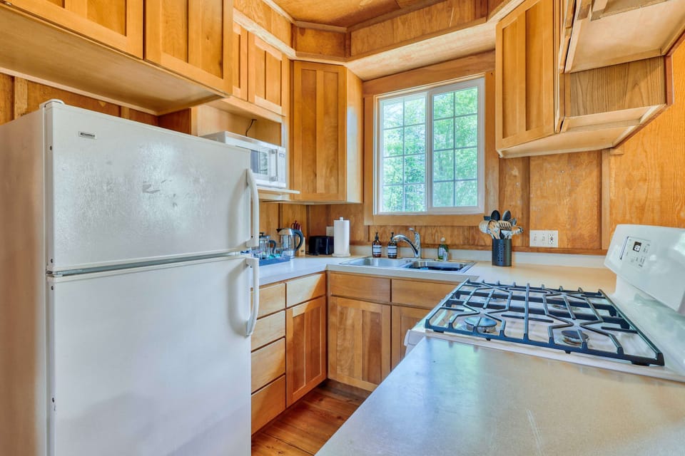 Kitchen: Bright and inviting space for culinary adventures awaits you! Let the cooking begin!