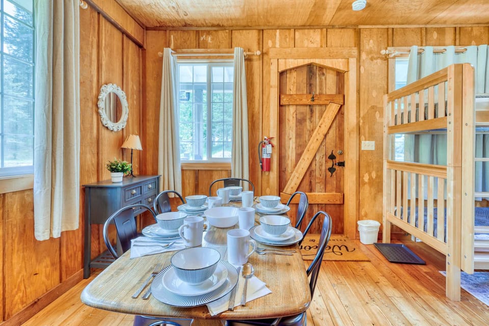 Dining Room: Gather around this rustic table, perfect for meals and laughter with family and friends!