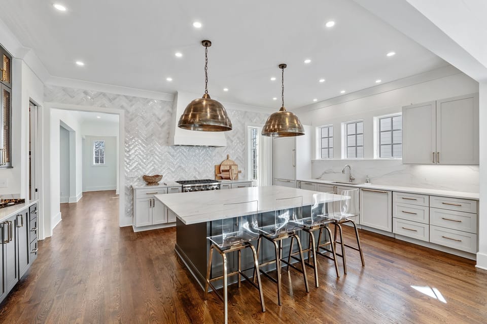 With a range gas oven, modern appliances this chef's kitchen is a dream.