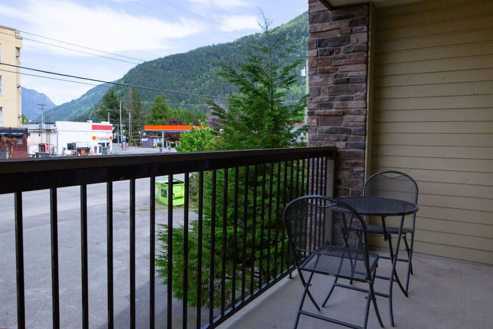 Private balcony with peaceful green views.