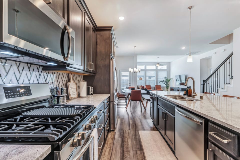 Our kitchen includes stainless steel stove, oven, microwave, dishwasher, fridge.