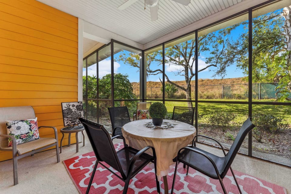 Dine alfresco or enjoy a cocktail on the screened patio