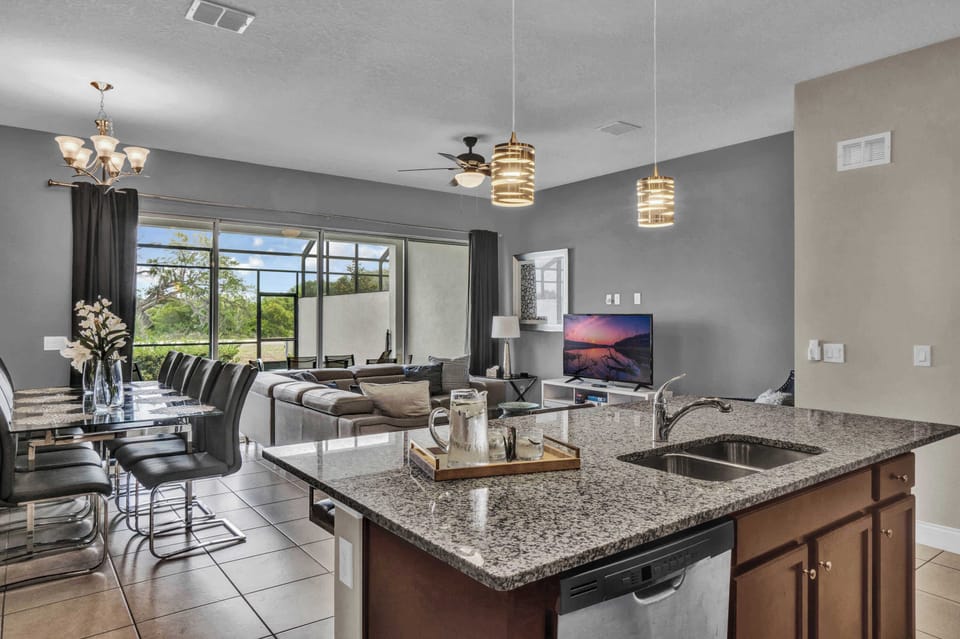 Open living, dining, and kitchen area