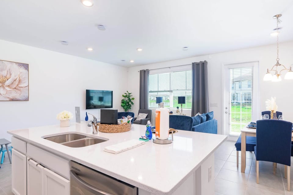 The sleek kitchen offers loads of space & all the comforts of home