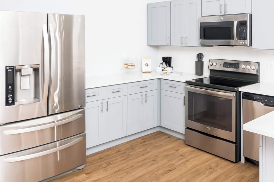 The kitchen offers ample storage space & all the comforts of home