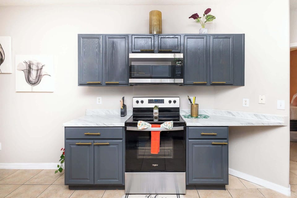 The open, airy kitchen offers ample space & all the comforts of home