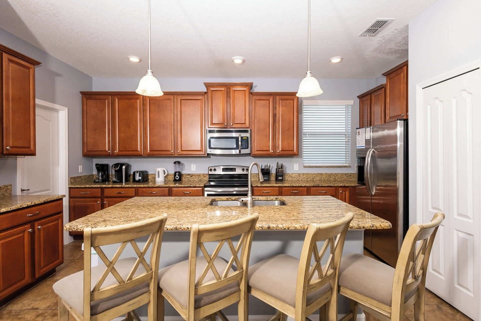 Bar-Counter seating is available for 4 in the open-concept kitchen