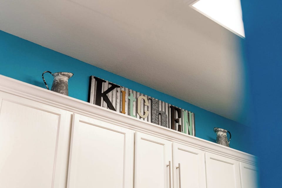 The open, airy kitchen offers ample space & all the comforts of home