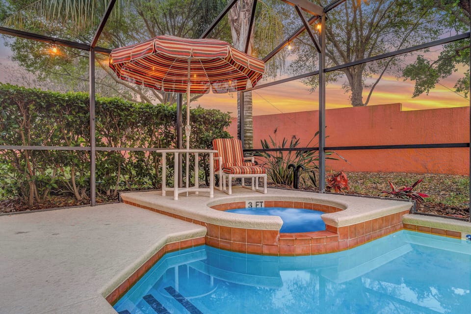 Private covered pool and hot tub with our seating