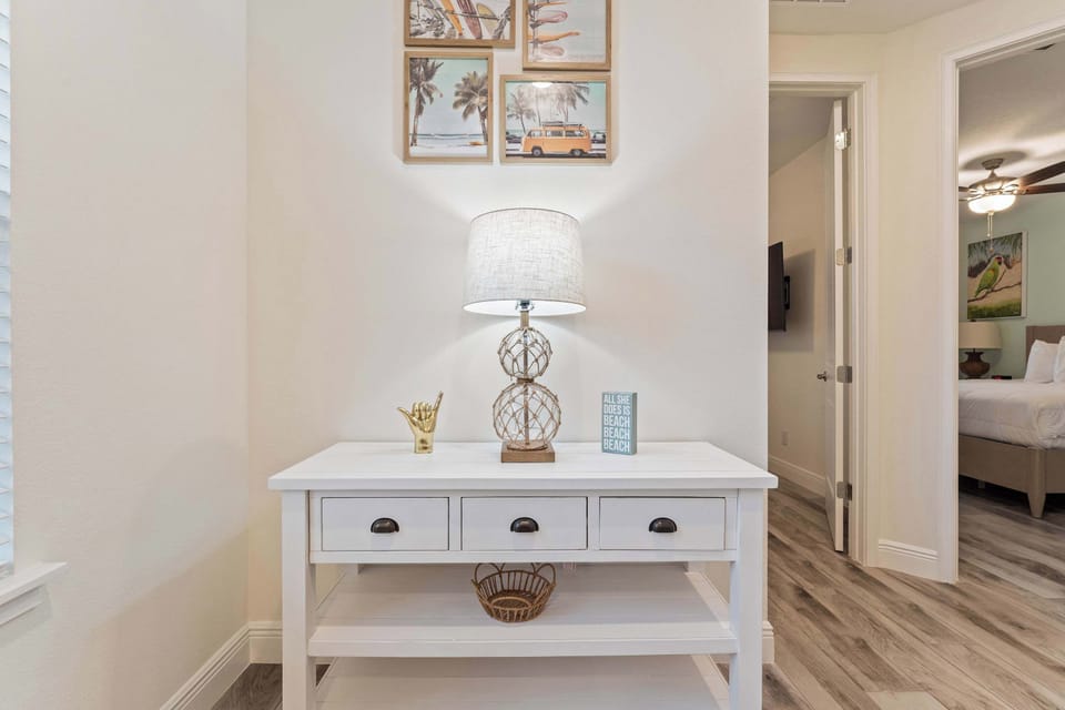 The airy 2nd floor hallway offers plenty of space & light