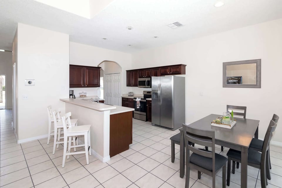 Additional seating along the counter and in the breakfast nook