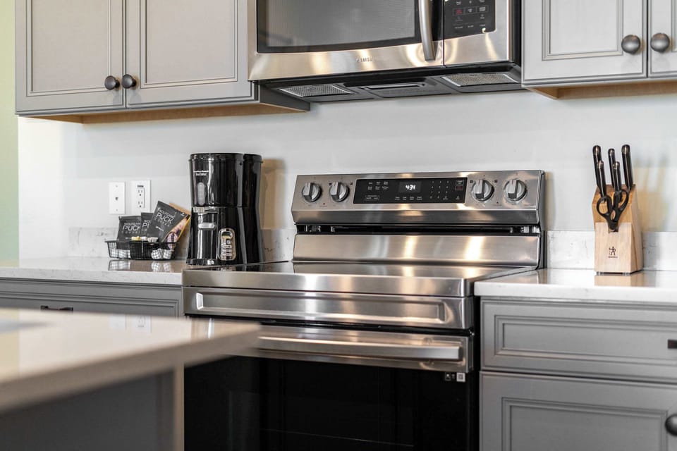 Whip up culinary delights in the modern & cozy kitchen
