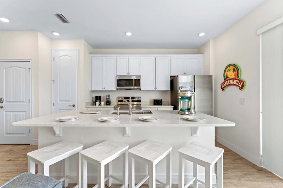 Sip morning coffee or grab a bite at the coastal counter, seating 4