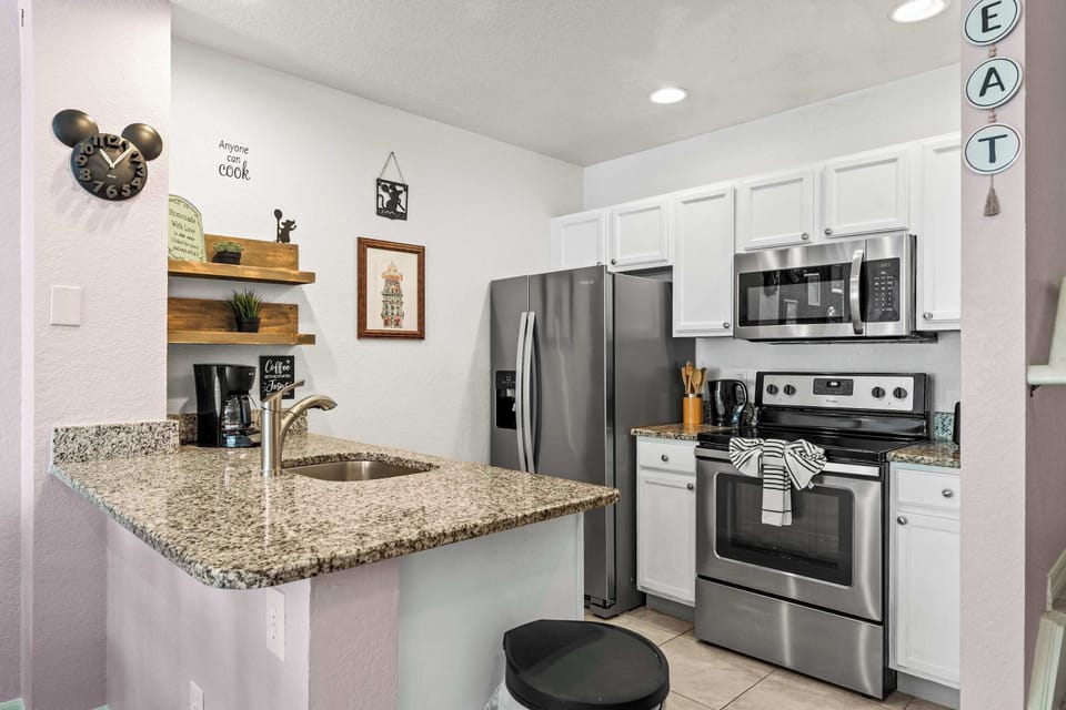 The open, airy kitchen offers ample space & all the comforts of home