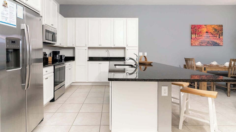 Kitchen with island bar seating