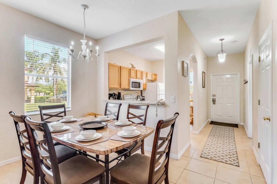 Enjoy meals together at the dining table, offering seating for 6