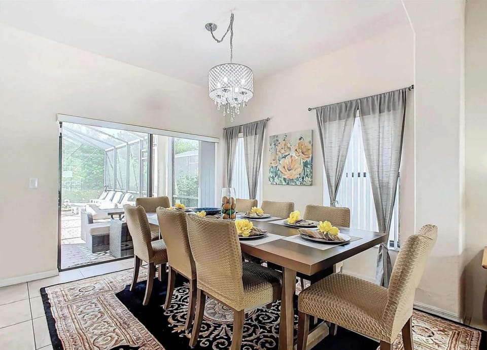 Dining area with table and seating for 8