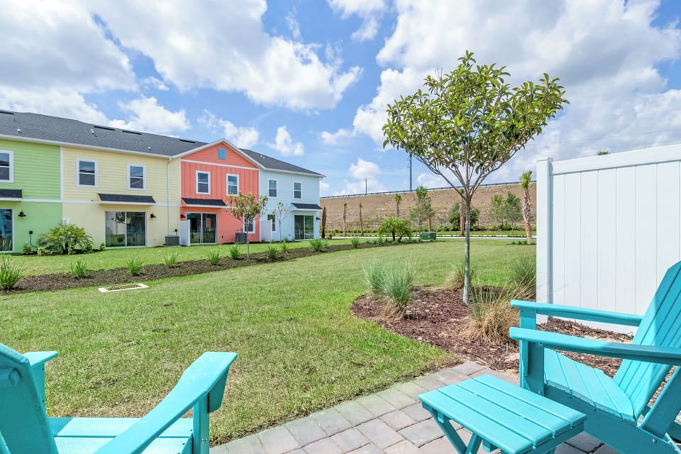 Lounge in the sunshine in the Adirondack chairs out back