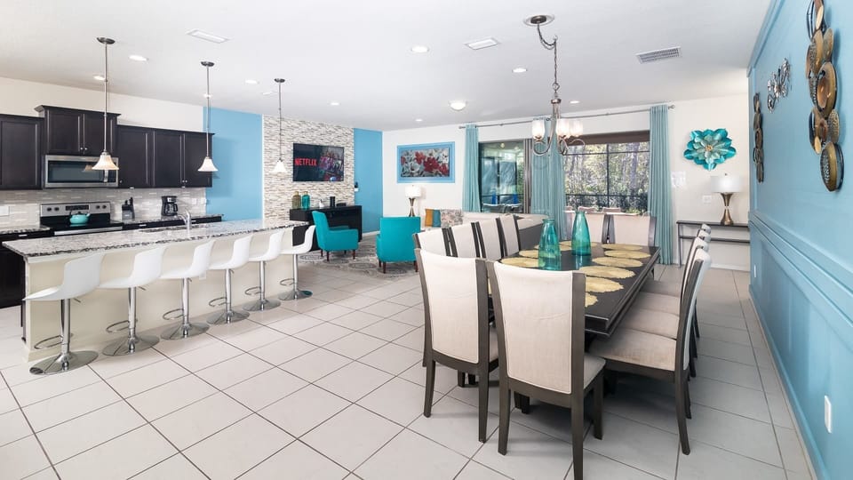 Dining, kitchen, and living area