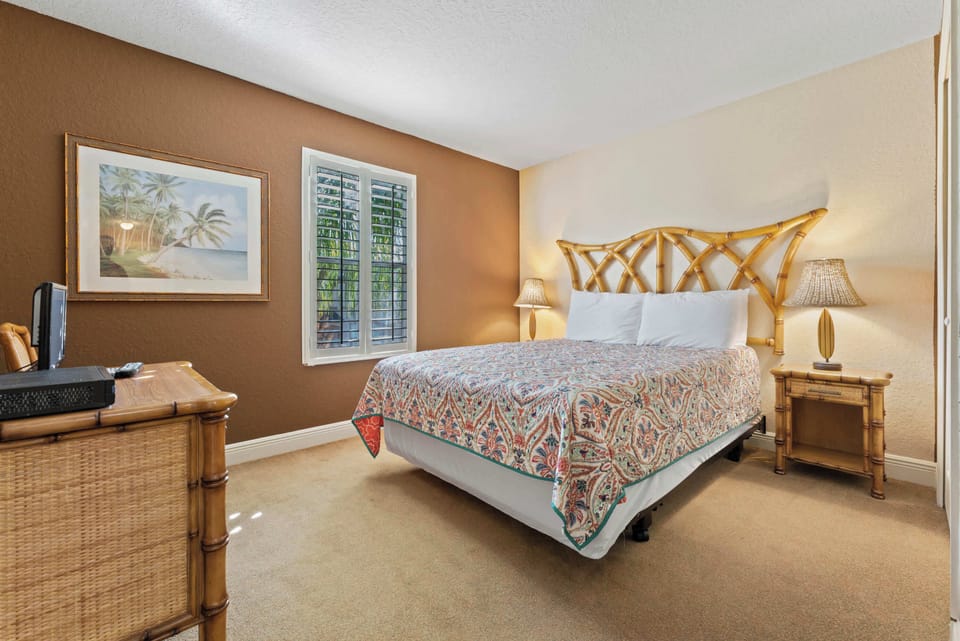 The 2nd of 2 queen bedrooms on the 2nd floor, with a TV