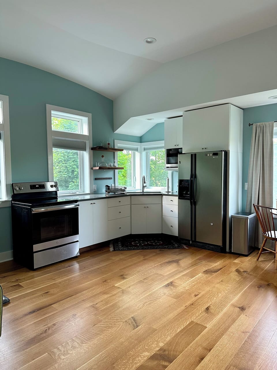 Kitchen within studio apartment.