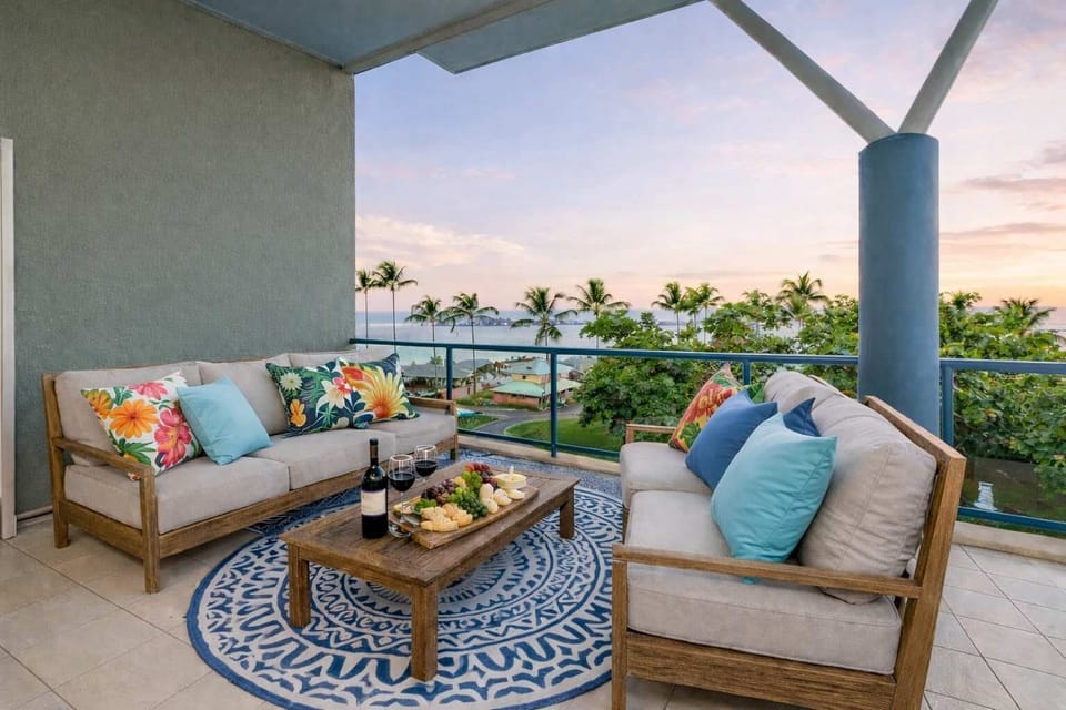 Enjoy sunset drinks from your private balcony overlooking The Strand and Coral Sea
