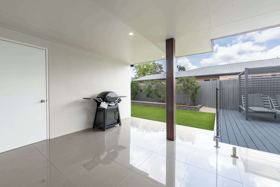 Indoor–outdoor living space with pool access
