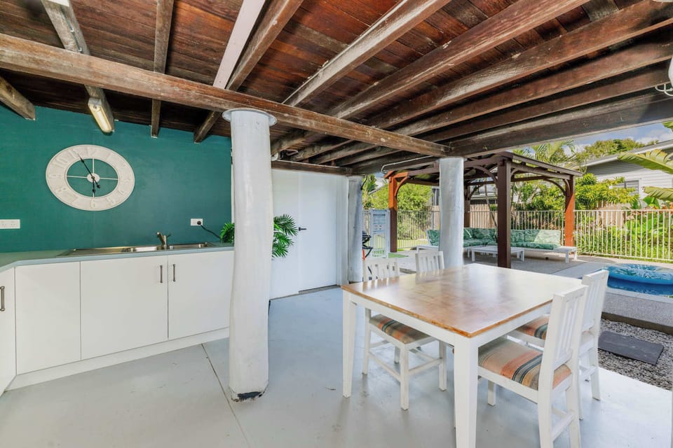 Covered outdoor dining area for easy entertaining
