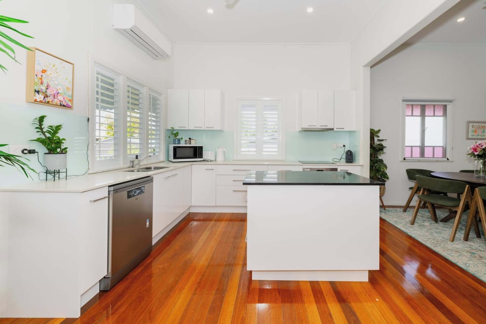 Fully equipped kitchen with island bench — perfect for family meals and longer stays.