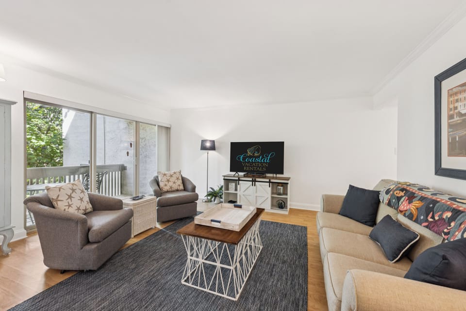 Living room with flat screen tv.
