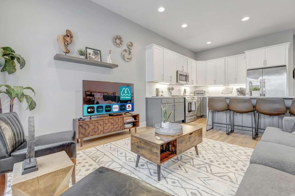 Experience Nashville's charm in this stylish vacation home, perfect for large groups. Enjoy a chic open layout, game room, and elegant dining area—ideal for bachelorette parties or corporate retreats, just minutes from downtown!