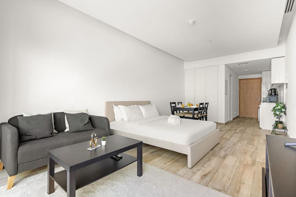 Studio Escape: Stylish living with modern decor and a dining area for perfect meals!