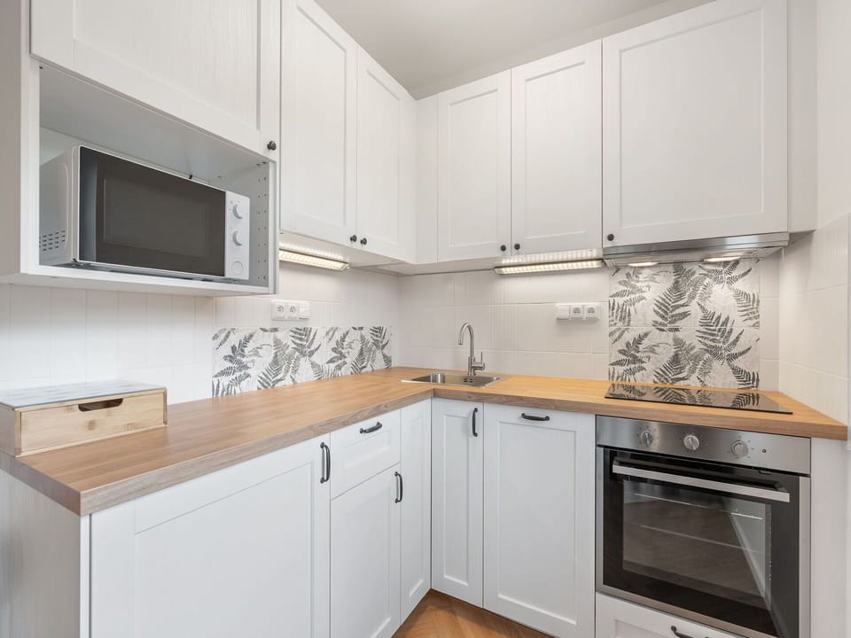 Kitchen, Countertop, Wood, Cabinetry, Flooring, Interior Design, Major Appliance, Kitchen Appliance, Home, Plumbing Fixture