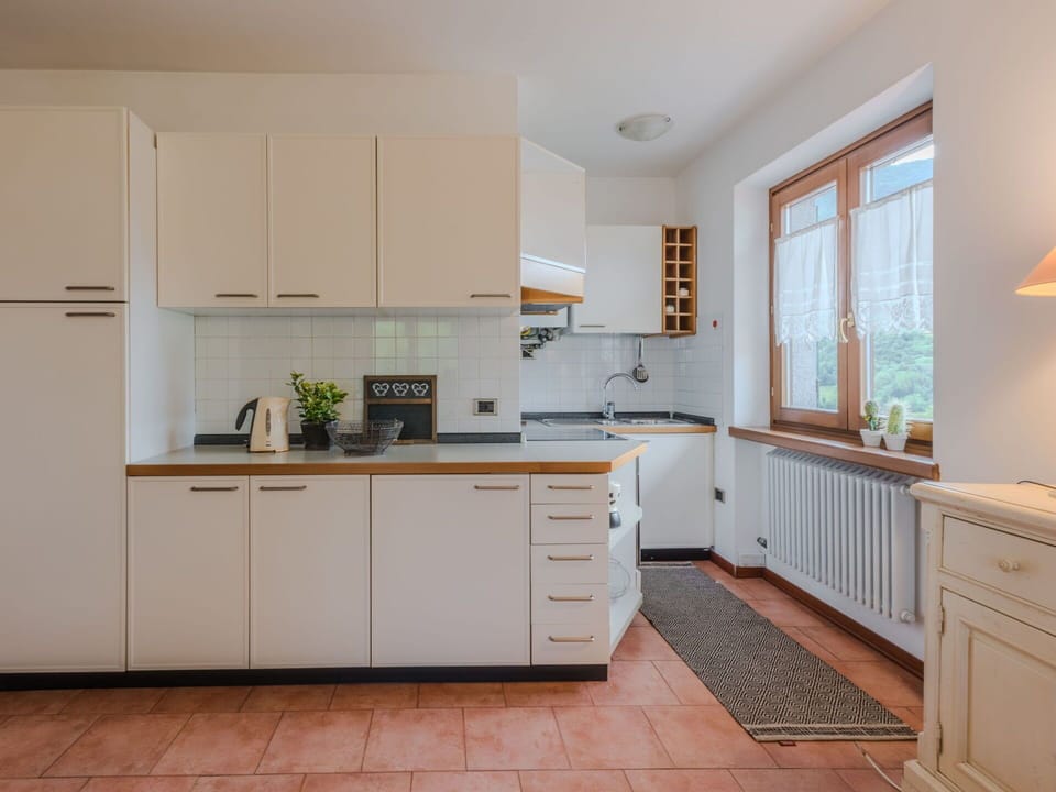 Kitchen, Kitchen Appliance, Countertop, Cabinetry, Interior Design, Flooring, Furniture, Major Appliance, Wood, Room