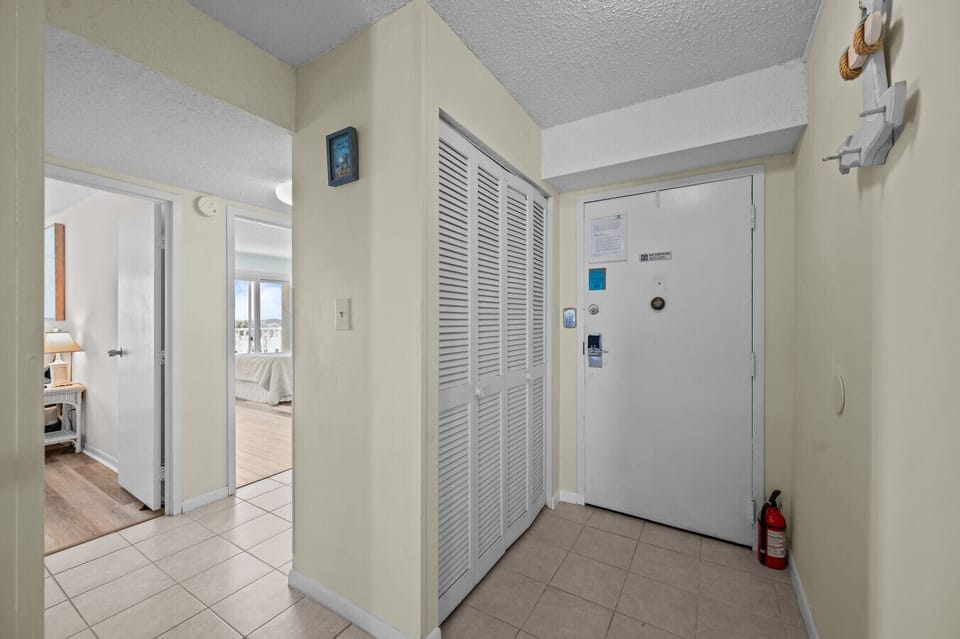Easy entry with a spacious hallway and plenty of closet storage, perfect for stashing beach gear and settling in fast.