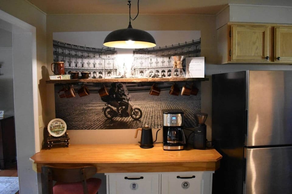 Coffee bar includes- Coffee Maker, Kettle, Coffee Grinder, Pore over, Coffee, Coffee Filters, Assorted Teas, Assorted creamers and Sweeteners. 