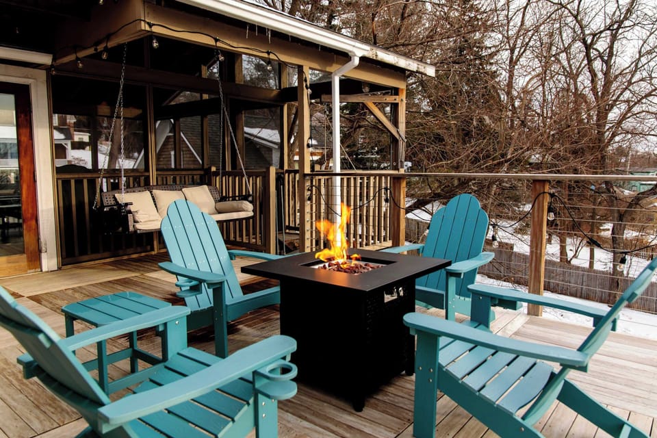 A propane grill and fire pit are provided for guest use, ensuring every night spent on the deck is a cozy evening full of precious memories