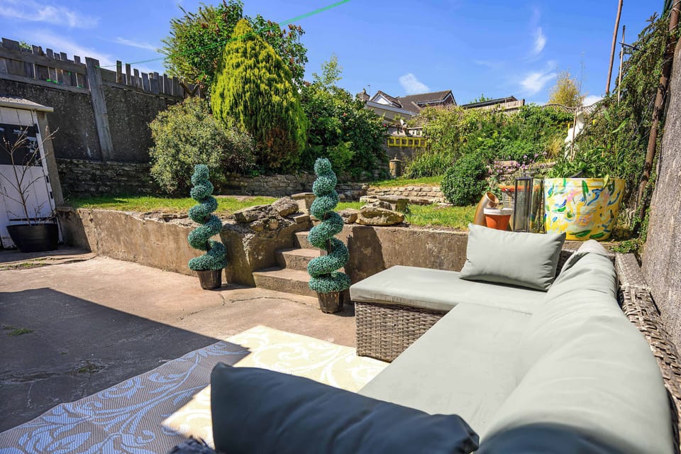 Garden with patio seating area