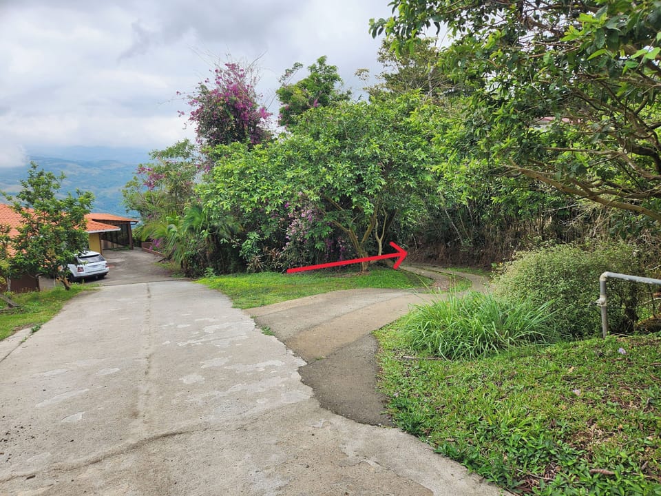 Close the gate behind you and proceed to the right down the hill.