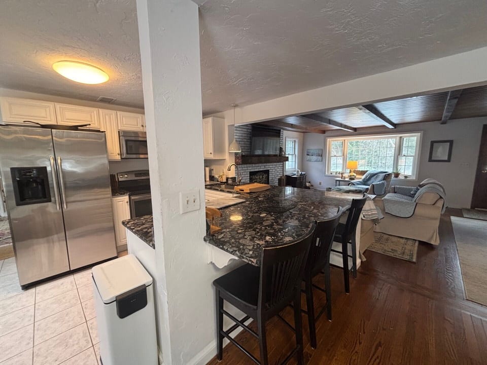 Kitchen Overlooks the Dining and Living Room