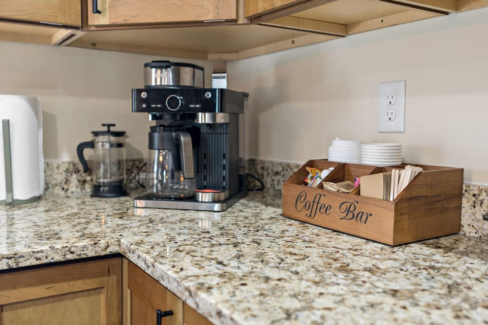 Coffee bar with drip, press and nespresso. Enjoy at the cabin or grab a cup 2 go