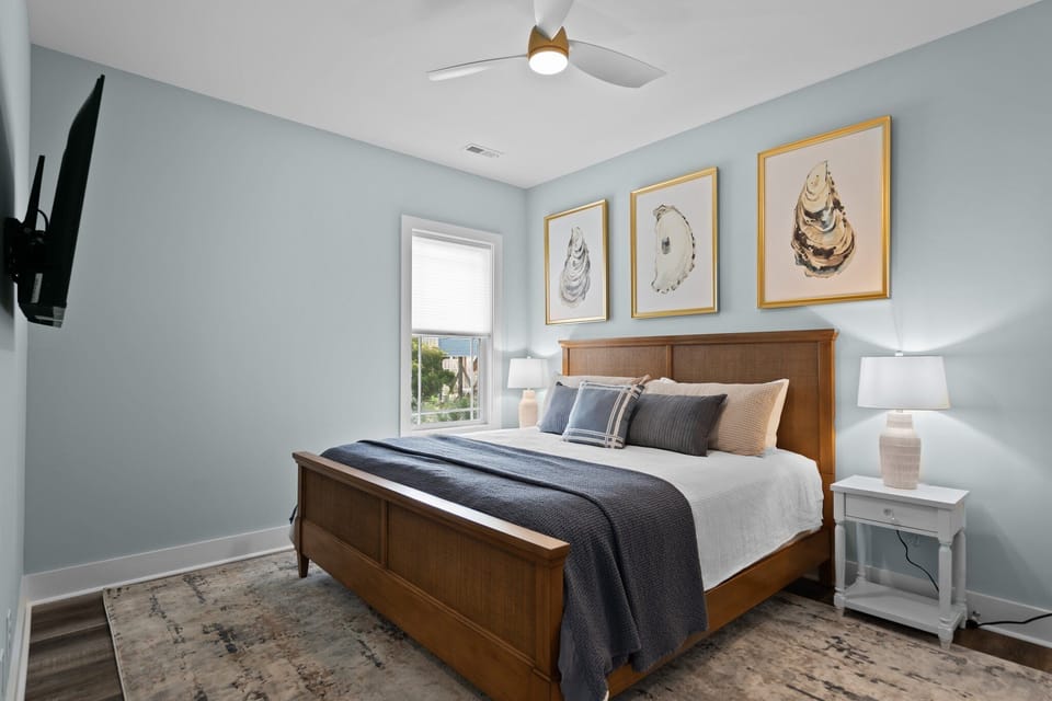 Secondary king bedroom with Roku smart TV.