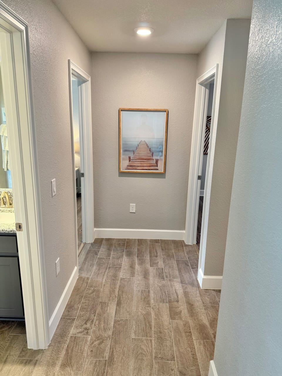 Back hallway leads to three additional bedrooms. A Florida "split floor plan".