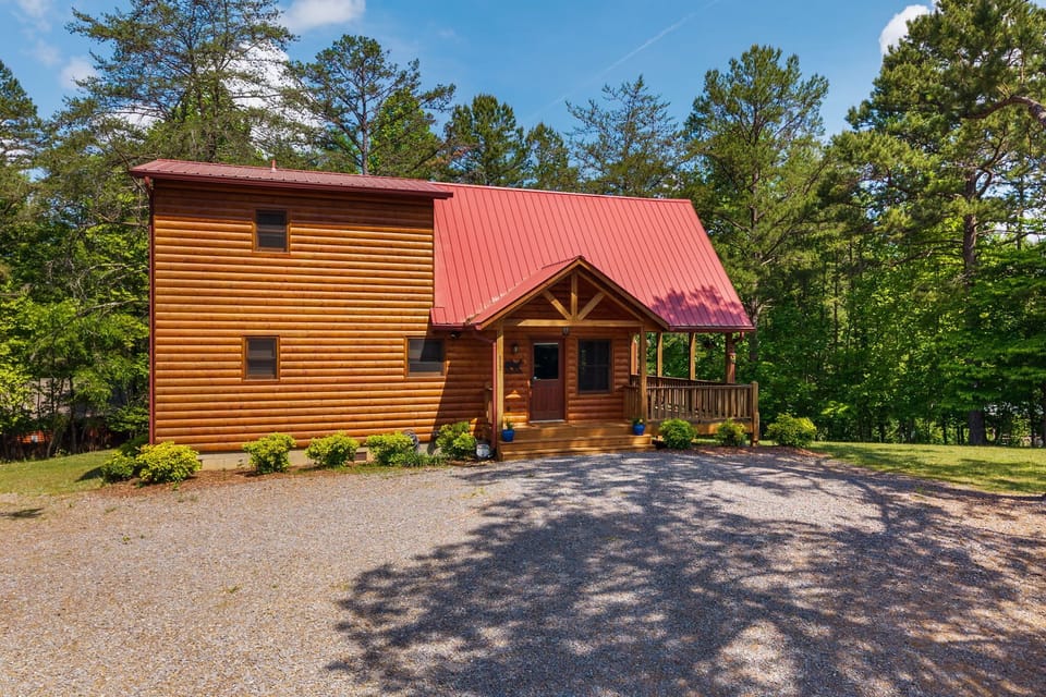 Exterior, ample parking in gravel driveway, even for motorcycle trailers.