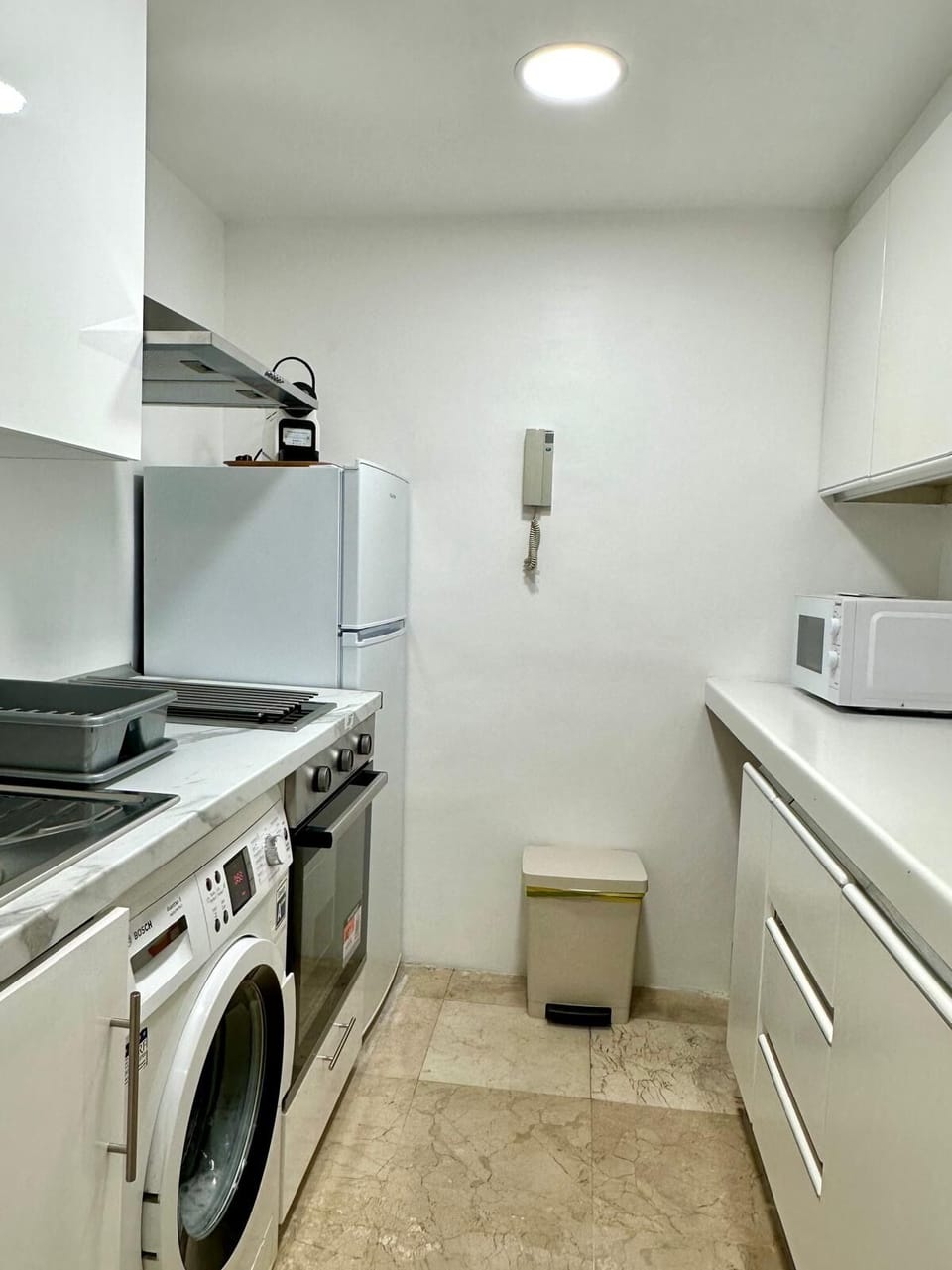 Small separate kitchen, but fully equipped with nespresso, dish washer,induction